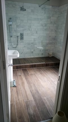 nice contrast of wood effect floor and marble effect wall